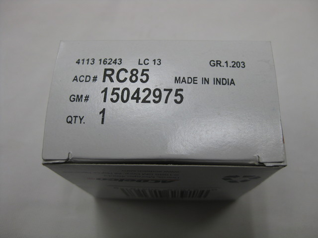 15042975 - Cooling System: Radiator Cap for Buick: Enclave, LaCrosse, Lucerne, Rainier | Chevrolet: Colorado, Express 1500, Express 2500, Express 3500, Express 4500, HHR, Impala, Monte Carlo, Trailblazer, Trailblazer EXT, Traverse | GMC: Acadia, Acadia Limited, Canyon, Envoy, Envoy XL, Envoy XUV, Savana 1500, Savana 2500, Savana 3500, Savana 4500 | Hummer: H3, H3T | Oldsmobile: Bravada | Pontiac: Grand Prix, Montana | Saturn: Outlook Image