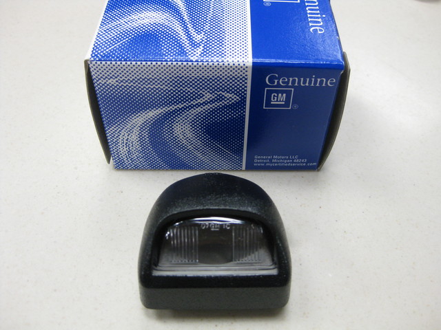 22794700 - : License Lamp for Cadillac: Escalade, Escalade ESV, Escalade EXT | Chevrolet: Avalanche, Avalanche 1500, Avalanche 2500, Silverado 1500, Silverado 1500 Classic, Silverado 1500 HD, Silverado 1500 HD Classic, Silverado 2500, Silverado 2500 HD, Silverado 2500 HD Classic, Silverado 3500, Silverado 3500 Classic, Silverado 3500 HD, Suburban 1500, Suburban 2500, Tahoe | GMC: Sierra 1500, Sierra 1500 Classic, Sierra 1500 HD, Sierra 1500 HD Classic, Sierra 2500, Sierra 2500 HD, Sierra 2500 HD Classic, Sierra 3500, Sierra 3500 Classic, Sierra 3500 HD, Yukon, Yukon XL 1500, Yukon XL 2500 Image