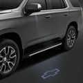 84408372 - : Outside Rearview Mirror Puddle Light kit with Bowtie Logo Projection for Chevrolet: Silverado 1500, Silverado 1500 LTD, Silverado 2500 HD, Silverado 3500 HD, Suburban, Tahoe Image