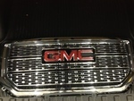 23496245 - : Bright Chrome Front Grille with GMC Emblem, Bezel, Adapter, Clips, Nuts, and Bolts for GM Image