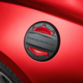 23506591 - Exterior: Fuel Filler Door - Black with Red Hot Inserts for GM Image