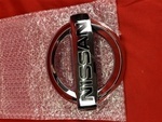 628903KA0A - Body: Emblem for Nissan Image