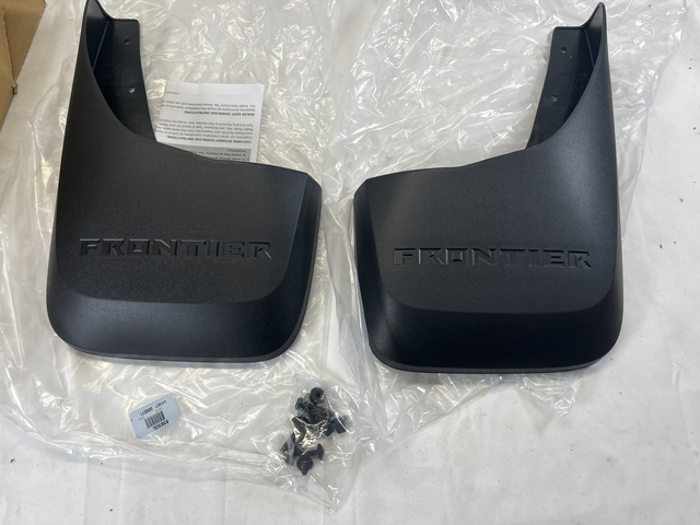 T99J29BY04 - Exterior: Genuine OEM Nissan Frontier Rear Mud Flaps T99J2-9BY04 2-Piece Black for Nissan Image
