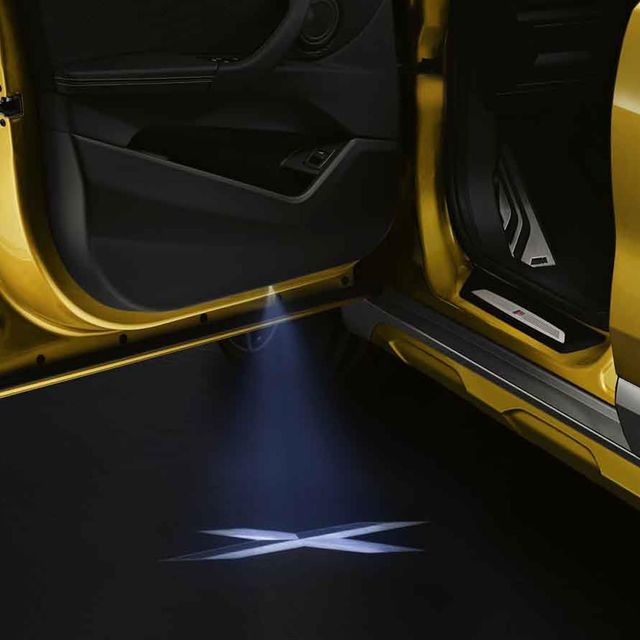 63312468386 - Exterior: Led Door Light Projectors for BMW: 228i, 230i, 320i, 328d, 328i, 330e, 330i, 330i GT xDrive, 340i, 340i GT xDrive, 428i, 430i, 435i, 440i, 528i, 530i, 535d, 535i, 535i GT, 540i, 550i, 550i GT xDrive, 640i, 640i Gran Coupe, 650i, 650i Gran Coupe, 740i, 740Li, 750i, 750Li, 760Li, 840i, Alpina B6 xDrive Gran Coupe, Alpina B7, M2, M235i, M240i, M3, M4, M5, M550i xDrive, M6, M6 Gran Coupe, M760i xDrive, M8, X1, X2, X3, X4, X5, X6, X7, Z4 Image