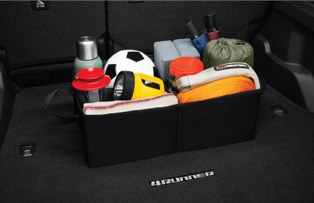 PT42700120 - Interior: Genuine Toyota Cargo Tote/Holder Trunk Organizer for Scion: FR-S, iA, iM, tC, xA, xB, xD | Toyota: 4Runner, 86, Avalon, bZ4X, C-HR, Camry, Corolla, Corolla Cross, Corolla iM, Crown, FJ Cruiser, GR Corolla, GR Supra, GR86, Grand Highlander, Highlander, Land Cruiser, Matrix, Mirai, Prius, Prius C, Prius Plug-In, Prius Prime, Prius V, RAV4, RAV4 Prime, Sequoia, Sienna, Solara, Tacoma, Tundra, Venza, Yaris, Yaris iA Image