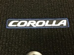 PT2060217128 - Interior: Genuine Toyota Corolla Carpet Floor Mats Black W/Blue Metallic Thread for Toyota: Corolla Image