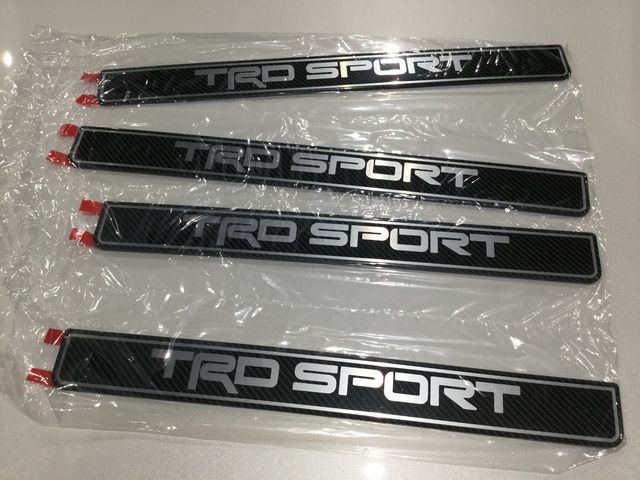 PT9480C180 - Exterior: Genuine Toyota Sequoia TRD SPORT Door Sill Protectors/Guards for Toyota Image