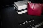 PT9193023002 - : Genuine Toyota Crown Black Carpeted Cargo/Trunk Mat for Toyota Image
