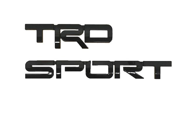 PT4130C18002 - Exterior: Toyota Genuine Sequoia TRD Sport Emblem PT413-0C180-02. Black TRD Sport. 2018-2019 Sequoia. for Toyota Image