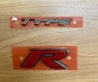 75732TGHA01 - : 17-21 HONDA CIVIC FRONT (TYPE-R) Nameplate for Honda: Civic Image
