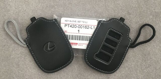PT42000162L1 - Security: 2013-2020 Lexus - Key Gloves, Black With Gray Stitching for Lexus: ES300h, ES350, GS Turbo, GS200t, GS300, GS350, GS450h, IS200t, IS250, IS300, IS350, IS500, LS460, LS600h, LX570, NX200t, NX300, NX300h, RC Turbo, RC200t, RC300, RC350, RX350, RX350L, RX450h, RX450hL Image