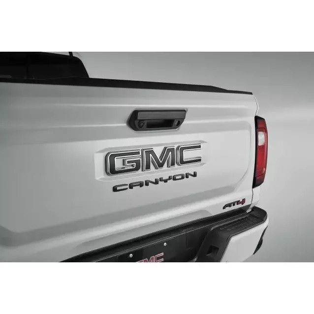 86539814 - Exterior: 2023-2025 GMC Canyon Front &amp; Rear "GMC" Emblems in Black GM OEM NEW 86539814 for GMC: Canyon, Sierra 1500, Sierra 1500 Limited, Sierra 2500 HD, Sierra 3500 HD Image