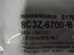 8C3Z6700B - : Gasket Front Seal for Ford: F-250 Super Duty, F-350 Super Duty, F-450 Super Duty, F-550 Super Duty Image