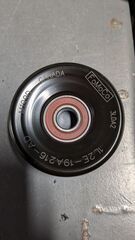 1L2Z8678AD - Cooling System: Tensioner for Ford: Bronco, Crown Victoria, E-150, E-150 Club Wagon, E-150 Econoline, E-150 Econoline Club Wagon, E-250, E-250 Econoline, E-250 Econoline Club Wagon, E-350 Club Wagon, E-350 Econoline, E-350 Econoline Club Wagon, E-350 Super Duty, E-450 Econoline Super Duty, E-450 Super Duty, E-550 Econoline Super Duty, E-550 Super Duty, Econoline Super Duty, Expedition, Explorer, Explorer Sport Trac, F-150, F-150 Heritage, F-250, F-250 HD, F-250 Super Duty, F-350, F-350 Super Duty, F-450 Super Duty, F-550 Super Duty, GT, Mustang | Lincoln: Aviator, Blackwood, Mark LT, Navigator, Town Car | Mercury: Grand Marquis, Mountaineer Image