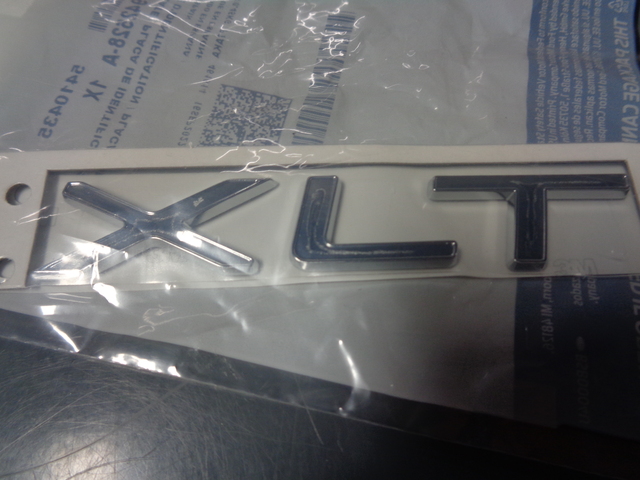 FK4Z9942528A - Body: Door Emblem for Ford Image