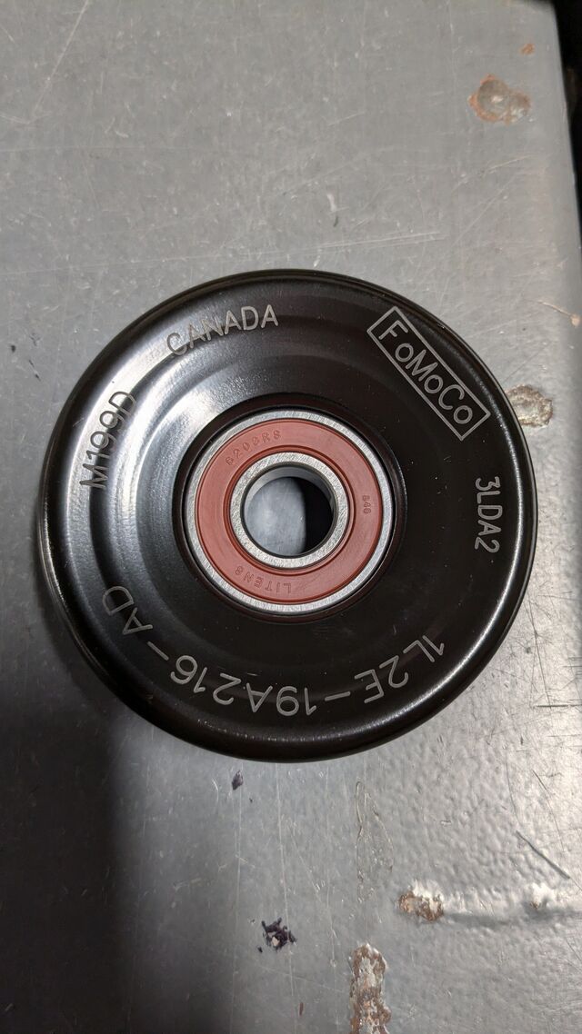 1L2Z8678AD - : Accessory Drive Belt Idler Pulley for Ford: Bronco, Crown Victoria, E-150, E-150 Club Wagon, E-150 Econoline, E-150 Econoline Club Wagon, E-250, E-250 Econoline, E-250 Econoline Club Wagon, E-350 Club Wagon, E-350 Econoline, E-350 Econoline Club Wagon, E-350 Super Duty, E-450 Econoline Super Duty, E-450 Super Duty, E-550 Econoline Super Duty, E-550 Super Duty, Econoline Super Duty, Expedition, Explorer, Explorer Sport Trac, F-150, F-150 Heritage, F-250, F-250 HD, F-250 Super Duty, F-350, F-350 Super Duty, F-450 Super Duty, F-550 Super Duty, GT, Mustang | Lincoln: Aviator, Blackwood, Mark LT, Navigator, Town Car | Mercury: Grand Marquis, Mountaineer Image