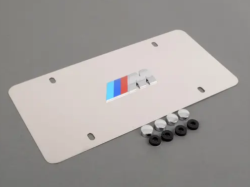 82121470398 - Exterior: Marque Plate, M Logo for BMW: 128i, 135i, 135is, 228i, 228i xDrive, 230i, 230i xDrive, 320i, 320i xDrive, 328d, 328d xDrive, 328i, 328i xDrive, 330e, 330i, 330i GT xDrive, 330i xDrive, 335i, 335i GT xDrive, 335i xDrive, 335is, 340i, 340i GT xDrive, 340i xDrive, 428i, 428i xDrive, 430i, 430i xDrive, 435i, 435i xDrive, 440i, 440i xDrive, 528i, 528i xDrive, 530i, 530i xDrive, 535d, 535d xDrive, 535i, 535i GT, 535i GT xDrive, 535i xDrive, 540d xDrive, 540i, 540i xDrive, 550i, 550i GT xDrive, 550i xDrive, 640i, 640i Gran Coupe, 640i xDrive, 640i xDrive Gran Coupe, 640i xDrive Gran Turismo, 650i, 650i Gran Coupe, 650i xDrive, 650i xDrive Gran Coupe, 740e xDrive, 740i, 740i xDrive, 740Li, 740Li xDrive, 750i, 750i xDrive, 750Li, 750Li xDrive, 760Li, 840i, Alpina B6 xDrive Gran Coupe, Alpina B7, M2, M235i, M235i xDrive, M240i, M240i xDrive, M3, M340i, M4, M5, M550i xDrive, M6, M6 Gran Coupe, M760i xDrive, M8, X1, X2, X3, X4, X5, X6, X7, Z4 Image