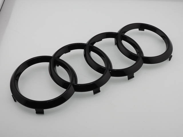 ZAW098010DDSP - Exterior: Genuine Audi Black Rings Audi Sign ZAW098010DDSP OEM for Audi Image